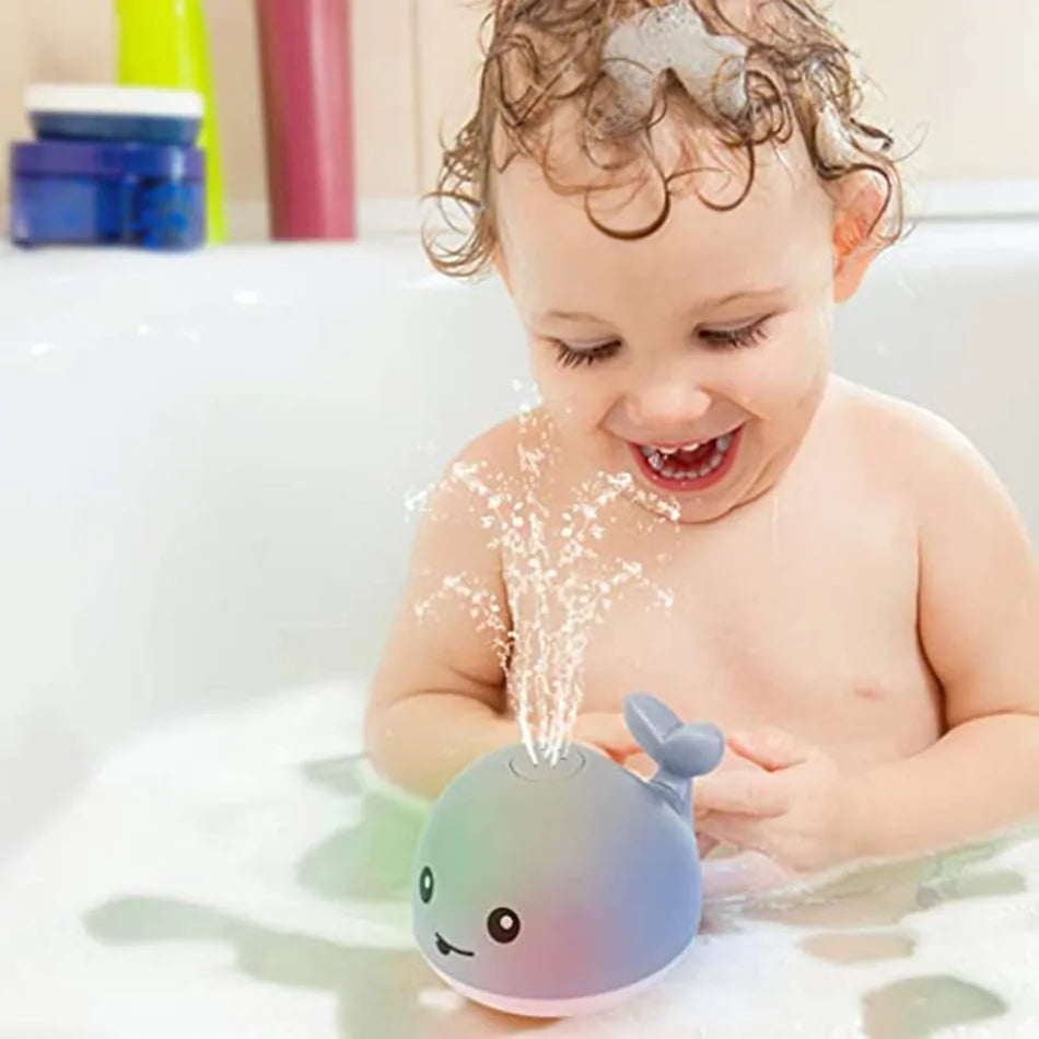 "Electric Whale Bath Ball: Water Spray Shower Toy with Light and Music