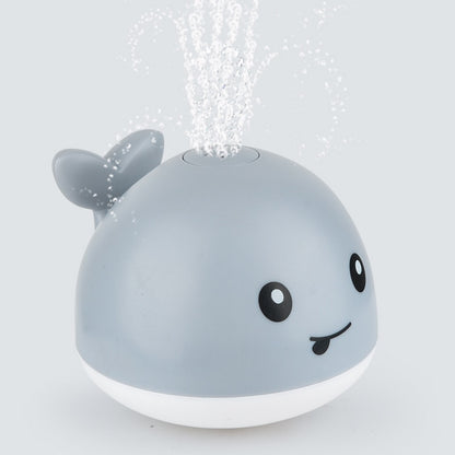 "Electric Whale Bath Ball: Water Spray Shower Toy with Light and Music